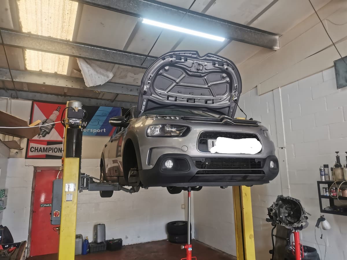 Mechanic working on a car